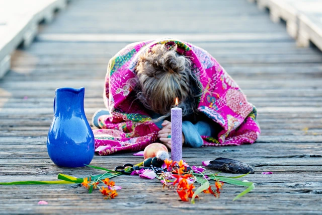 Lexi bowing in ceremony. Somatic work often leads to greater clarity, freedom, and flexibility in our lives.